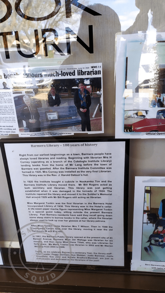 A window display of Barmera Public Library showing a newspaper clippings of their 100 years of celebration