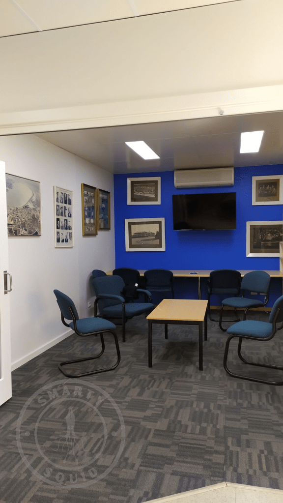 inside barmera public library looking at blue chairs around small tables
