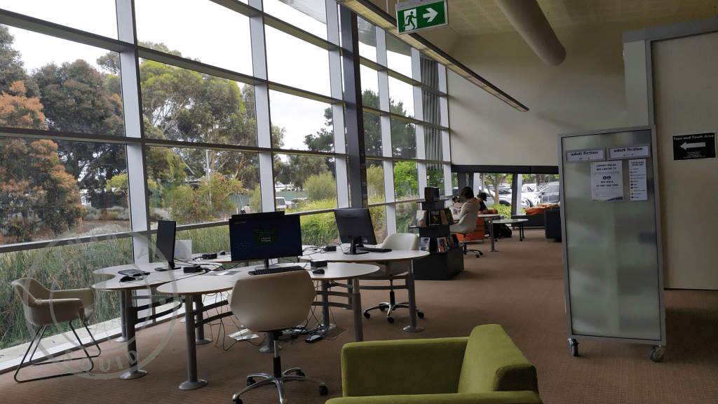 inside Victor Harbor Library looking at computer screens on desks along big windows